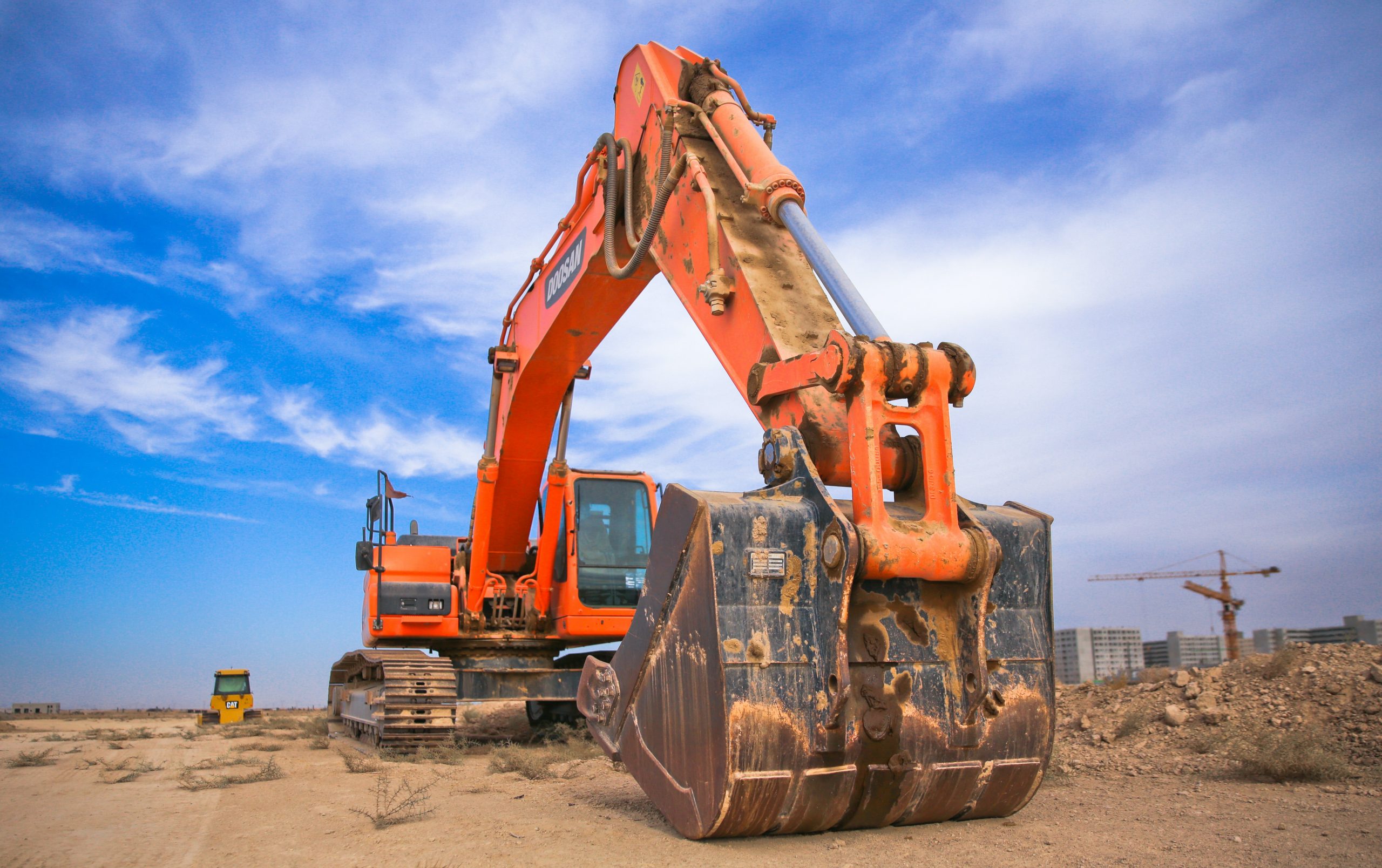 Orange Digger on Dirt - Asset Finance